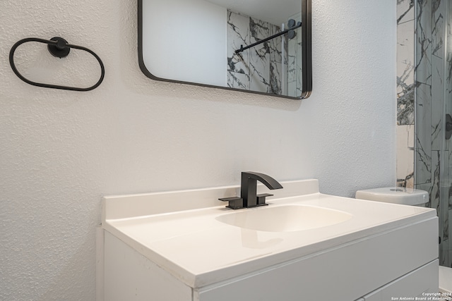 bathroom with vanity and walk in shower