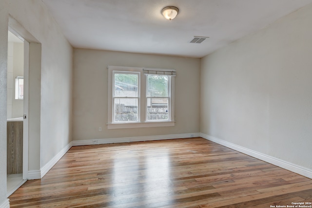 empty room featuring light hardwood / wood-style floors