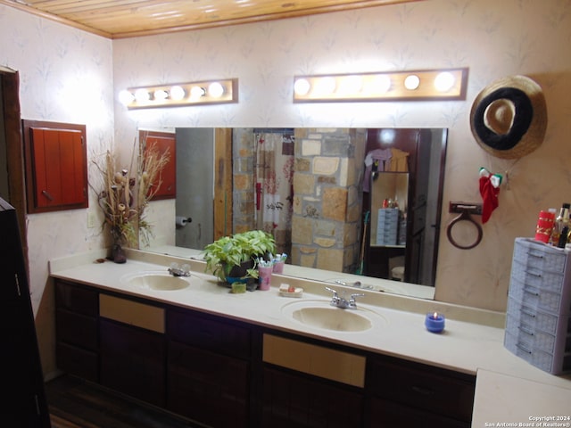 bathroom featuring vanity and wood ceiling