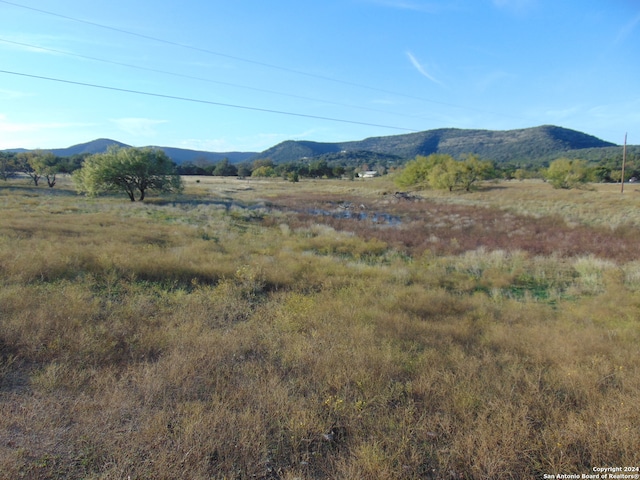 view of mountain feature featuring a rural view