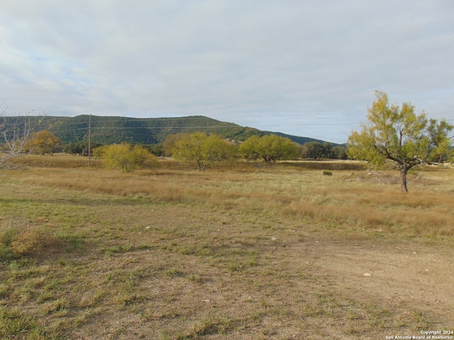 view of mountain feature featuring a rural view