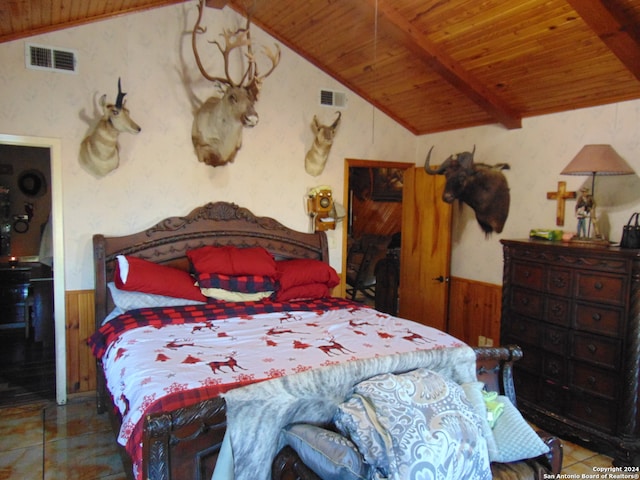 bedroom featuring wooden ceiling, tile patterned flooring, lofted ceiling with beams, and wood walls