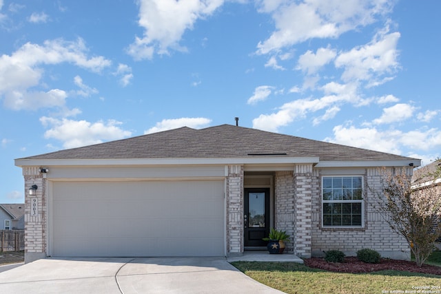 single story home with a garage