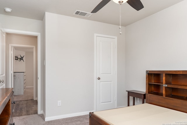 bedroom with ceiling fan and carpet