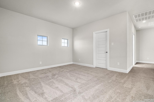 empty room featuring carpet flooring