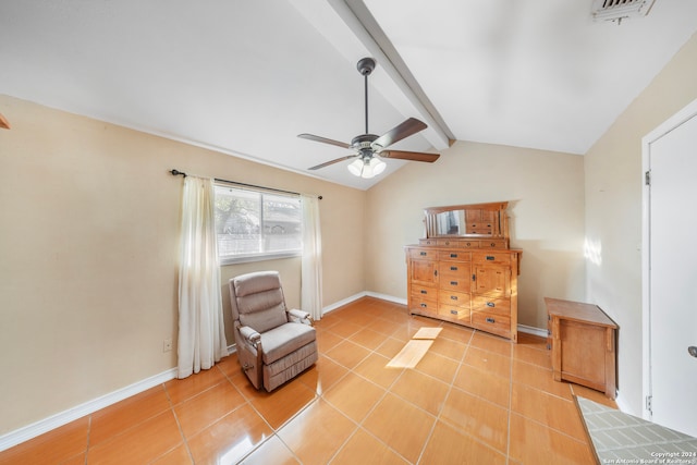 living area featuring lofted ceiling with beams, ceiling fan, and light tile patterned floors