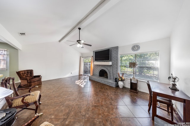 living room featuring a fireplace, lofted ceiling with beams, and ceiling fan