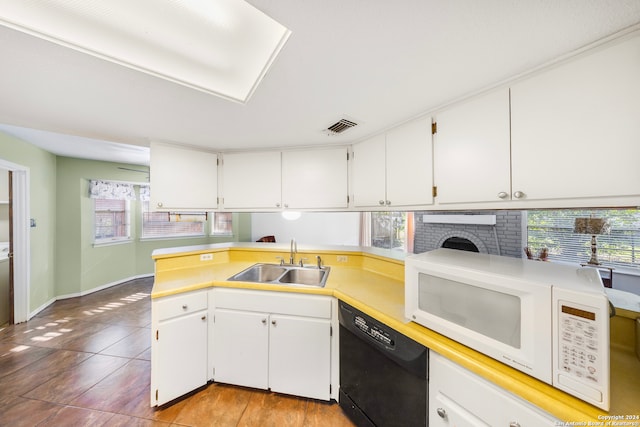 kitchen featuring dishwasher, light wood-type flooring, white cabinetry, and sink