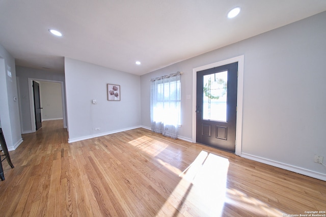 foyer with light wood-type flooring