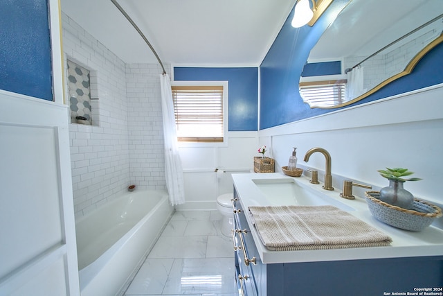 full bathroom featuring shower / tub combo with curtain, vanity, and toilet