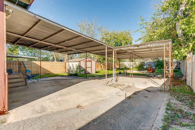 view of parking / parking lot featuring a carport