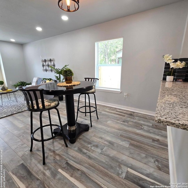 dining room featuring dark wood-type flooring