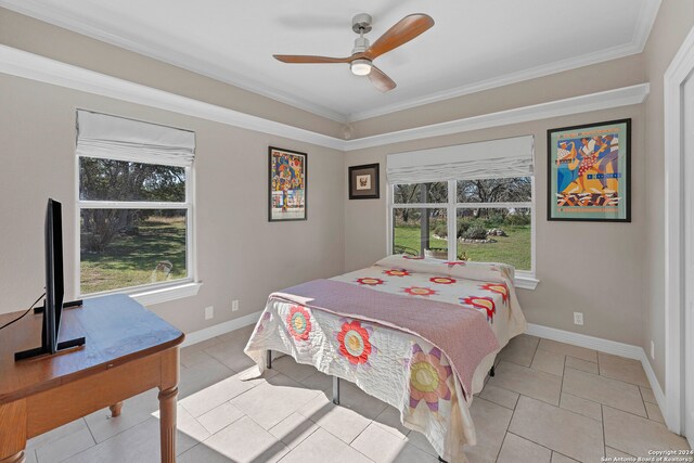 bedroom featuring light tile patterned flooring, multiple windows, ornamental molding, and ceiling fan