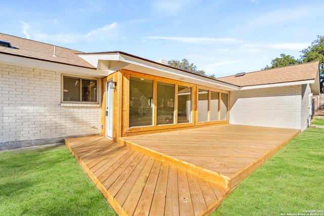 deck featuring a yard