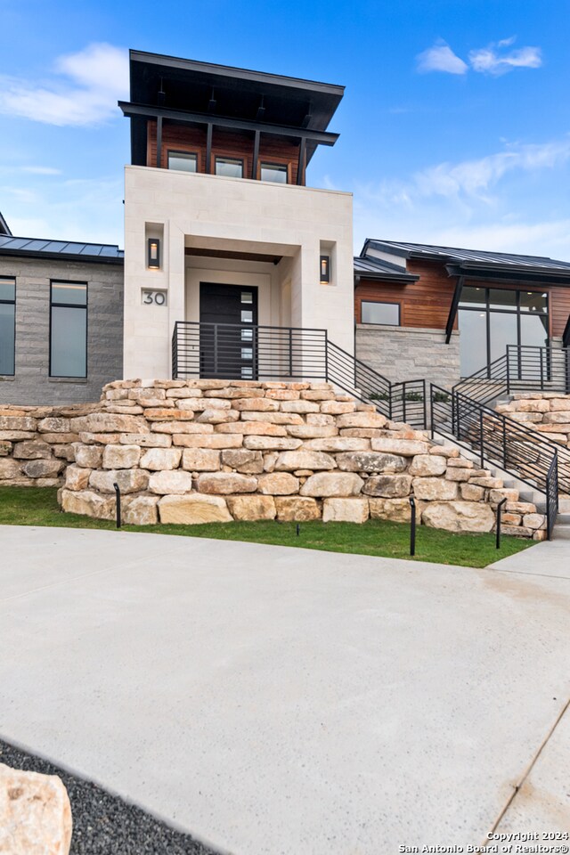 contemporary house with a balcony