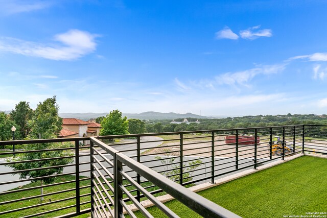 balcony featuring a mountain view