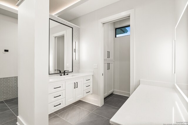 bathroom with vanity and tile patterned floors