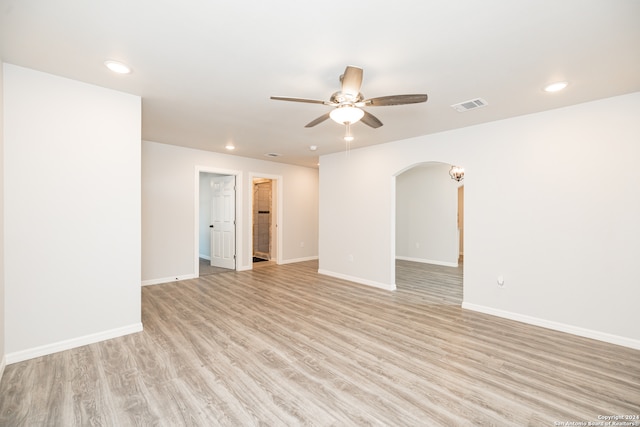 spare room with light hardwood / wood-style floors and ceiling fan