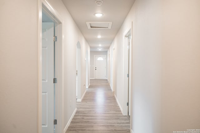 hallway featuring light hardwood / wood-style floors