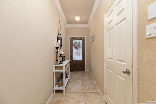 doorway with ornamental molding and light tile patterned floors