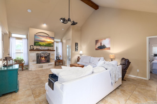 tiled living room featuring a fireplace, high vaulted ceiling, and beamed ceiling