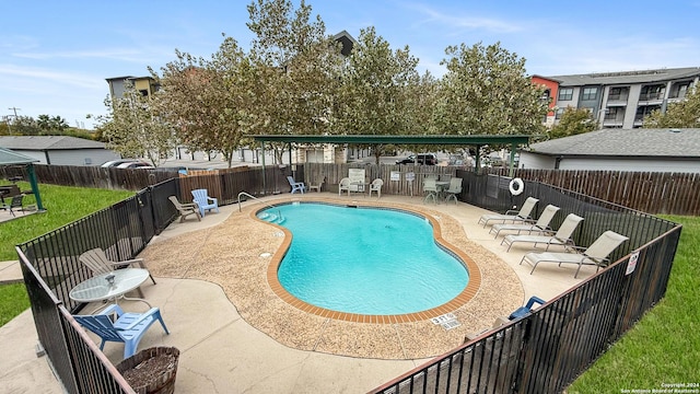 view of swimming pool featuring a patio