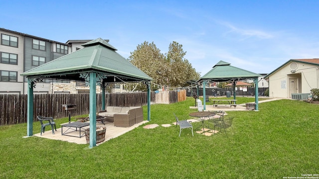 view of jungle gym featuring a gazebo, an outdoor hangout area, and a yard