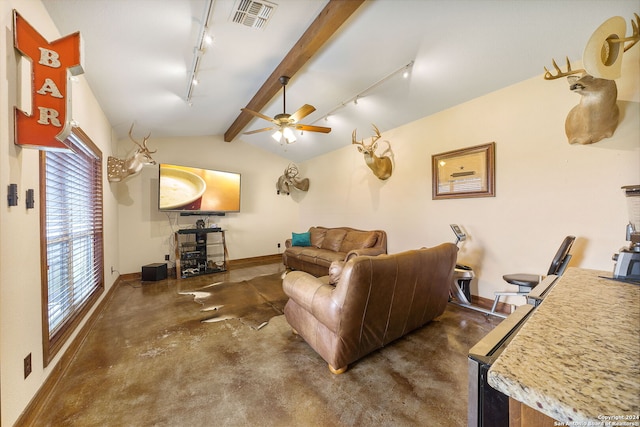 living room with lofted ceiling with beams, rail lighting, and ceiling fan