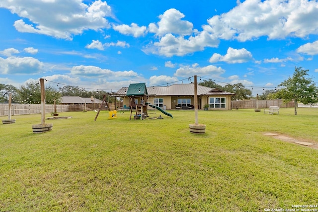 view of yard with a playground