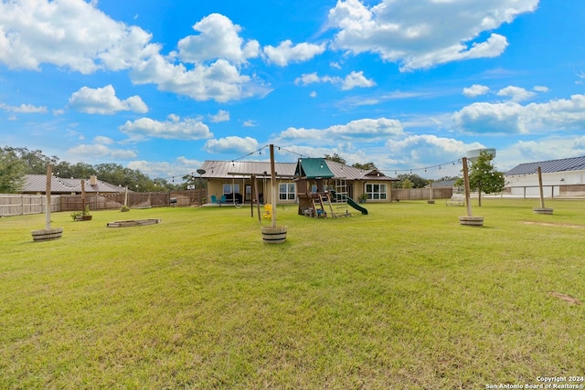 view of yard featuring a playground