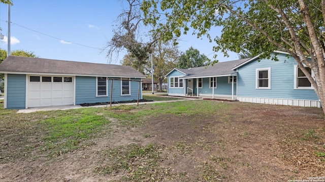 603 E Cedar St, Seguin, TX 78155 - view of front of house with a porch and a garage