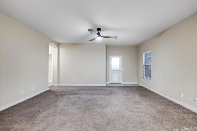 carpeted empty room with ceiling fan