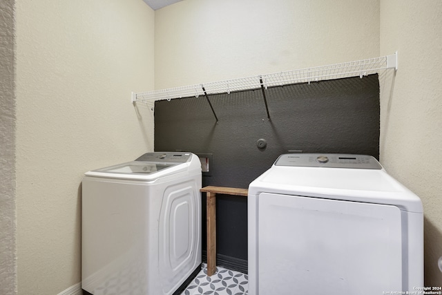 washroom with washer and clothes dryer