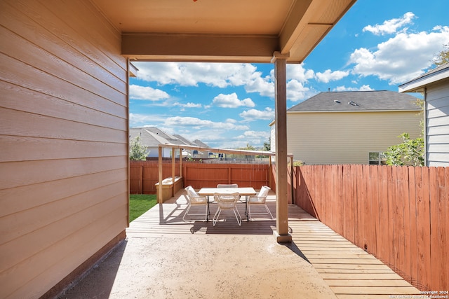 view of patio with a wooden deck