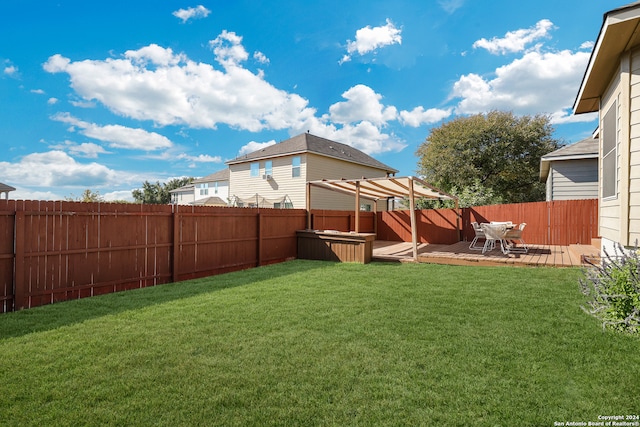 view of yard featuring a pergola and a wooden deck