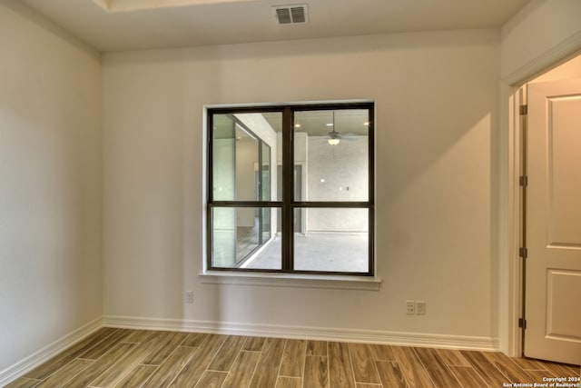 empty room featuring hardwood / wood-style floors