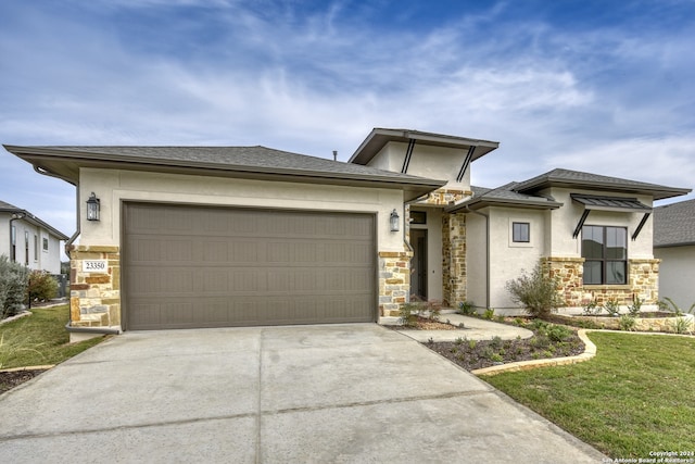 prairie-style home with a garage