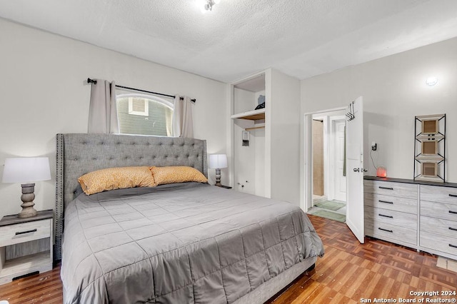 830 Canton, San Antonio, TX 78202 - bedroom with a textured ceiling