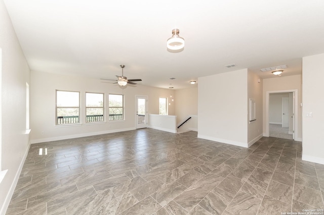 unfurnished room featuring ceiling fan