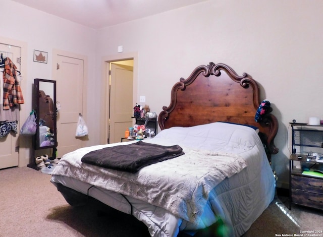 bedroom featuring carpet flooring