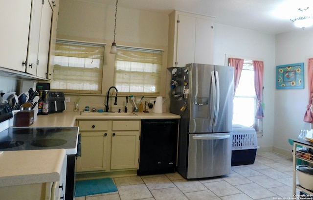 kitchen with stainless steel refrigerator with ice dispenser, sink, range, black dishwasher, and white cabinetry