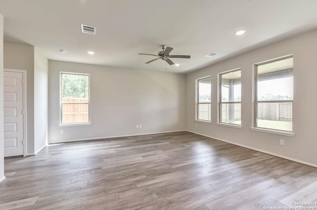 14344 Iron Knight, San Antonio, TX 78253 - spare room featuring ceiling fan, wood finished floors, baseboards, and recessed lighting