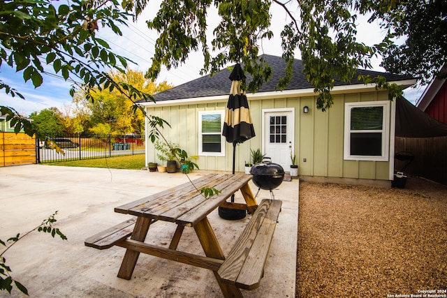 back of property featuring a patio area