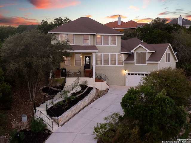 view of front of home with a garage