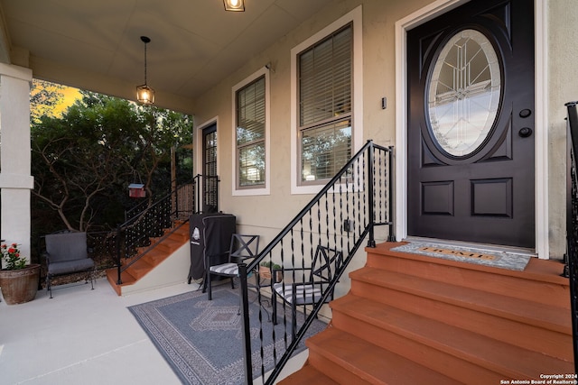 entrance to property with covered porch