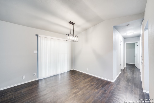 unfurnished dining area featuring dark hardwood / wood-style floors