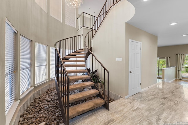 206 Bluff Holw, San Antonio, TX 78216 - stairs with a chandelier, baseboards, and recessed lighting