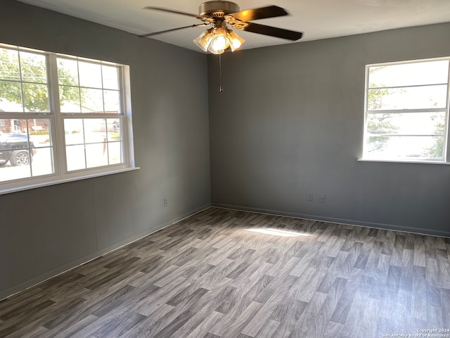 spare room featuring ceiling fan and wood-type flooring