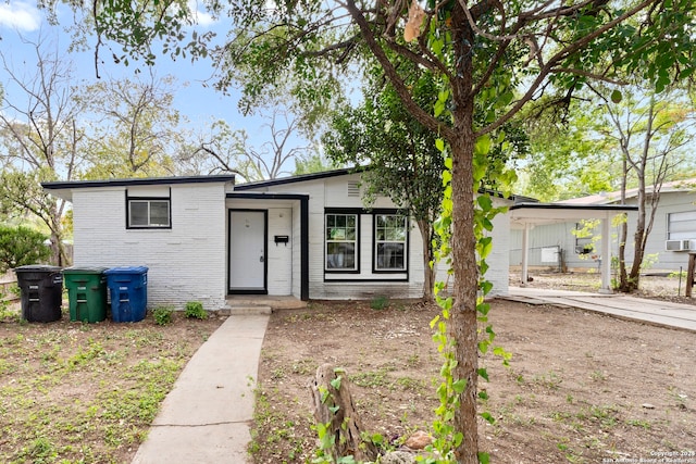 view of front of house with a carport