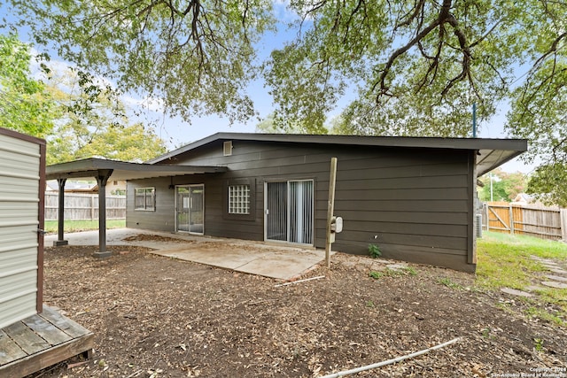 back of house featuring a patio